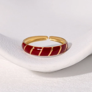 Vintage adjustable stainless steel ring with gold finish and red enamel stripes