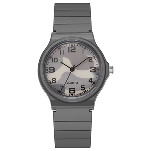 Detail of gray camouflage dial and quartz movement on child's silicone wrist watch