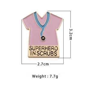 Enamel medical scrub brooch with superhero in scrubs text and blue stethoscope detail