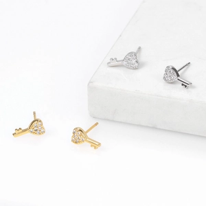 Gold and silver 18k plated copper key stud earrings with sparkling cubic zirconia