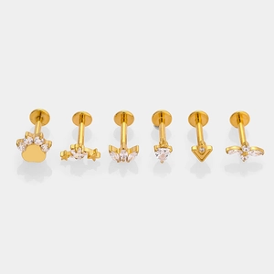 G23 titanium golden piercing studs set with stars and leaves shapes and clear zircon stones