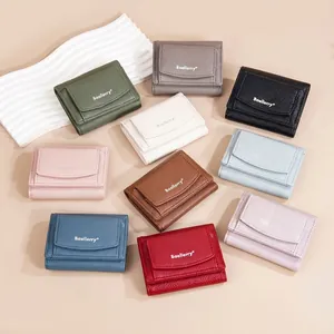 Three-fold leather wallets for women in ten vibrant colors with litchi grain texture