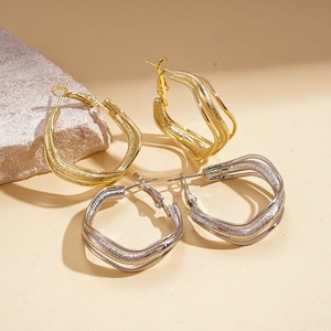 Textured wavy triple-layered hoop earrings in gold and silver finish for women