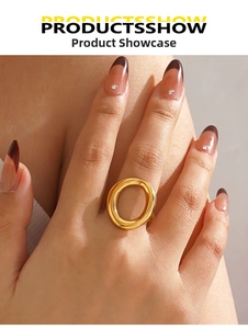 Close-up of a 18K gold plated hollow oval ring showing its chunky geometric design