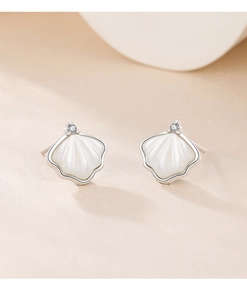 Detail of S925 silver ginkgo leaf stud earrings with white mother-of-pearl inlay