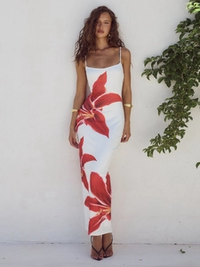 Slim fit white summer maxi dress with vibrant red floral print and thin spaghetti straps