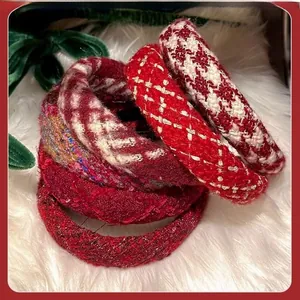 Detail of red tweed headbands with houndstooth and woven textures for winter hair styling