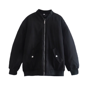 Detailed close-up of black bomber jacket with silver zipper and ribbed cuffs