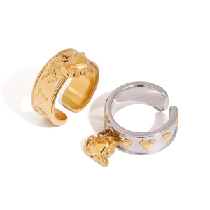 Titanium steel open rings with 3D heart charms in gold and silver finish on white background