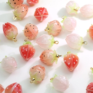 Colorful strawberry pendant charms for DIY jewelry making in various gradient finishes