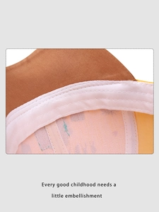 Detailed close-up of the precision stitching and sweatband inside the kids dinosaur hat