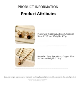 Tiger eye bow earrings and necklace set with zircon stones and copper details