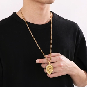 Gold lion head shield pendant with rhinestones on a twist rope chain for men