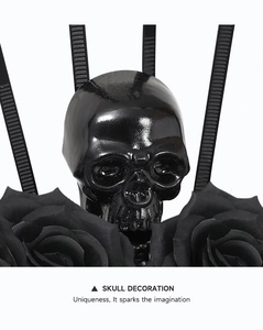 Detail of gothic black skull headband with artificial roses and zip ties for cosplay