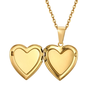 Golden heart locket necklace with open design for photos on white background