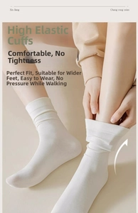 Detailed shot of white long-staple cotton sock with high-elastic ribbed cuff for comfort
