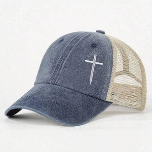 Adjustable washed denim trucker hat with mesh back and side cross embroidery