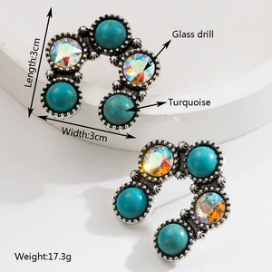 Close-up of vintage silver earrings with turquoise and glass drill, size 3cm by 3cm