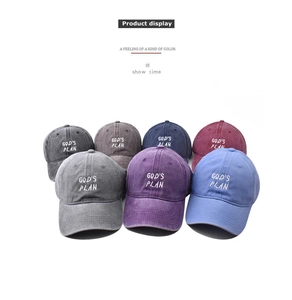 Detailed flat lay of God's Plan vintage washed cotton baseball caps in multiple colors