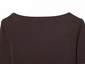 Detail shot of a coffee brown off-the-shoulder knit top featuring premium fabric texture