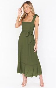 Elegant olive green sleeveless maxi dress with bow shoulder straps and ruffled hemline