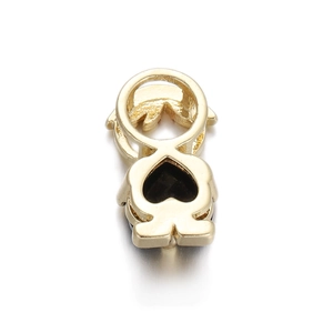 Detailed close-up of a golden boy-shaped pendant with heart cutout for DIY jewelry