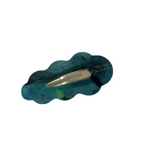 Barrette à cheveux en acétate forme nuage avec texture marbre et texte doré la France