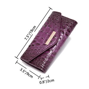 Detailed dimension view of purple crocodile embossed faux leather wallet showing 19cm length