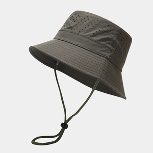 Detail of army green outdoor sun hat with breathable laser-cut holes and windproof cord