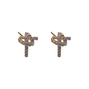 Minimalist knot geometric stud earrings with micro-set cubic zirconia in silver