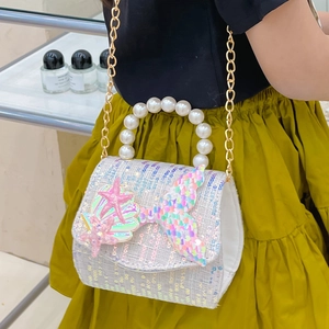 Kids pearl handle crossbody bag with sequin mermaid tail and starfish details