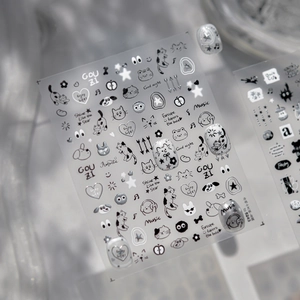 Detailed macro view of minimalist black and white cat graffiti nail art embossed stickers
