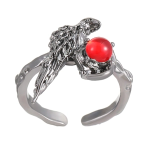 Gothic dark raven ring with red bead and gunmetal lava texture in adjustable open style