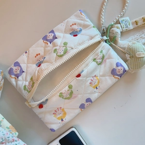 Quilted floral cat cosmetic bag detail with pearl chain and lace heart charm accessory