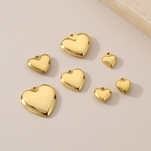 Polished gold stainless steel heart pendants in various sizes for DIY jewelry making