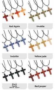 Detail view of natural stone cross pendants in Red Agate, Unakite, and Sodalite varieties
