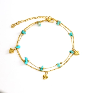 Double-layered gold-plated heart bracelet featuring blue turquoise and bohemian tassels