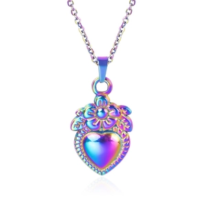 Macro shot of 18k gold plated stainless steel heart pendant with floral details