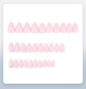 Detailed set of 30 light pink almond-shaped press-on nails displayed on a flat board