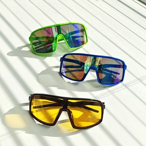 Detailed close-up of UV400 kids sport sunglasses with CE marks and shadow effects