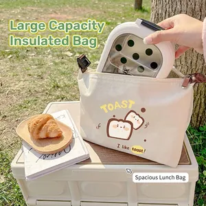 Insulated canvas lunch bag with cute toast print and handle for outdoor picnic use