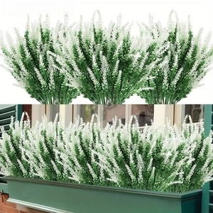 Detail of white artificial lavender plants in window box and individual stems display