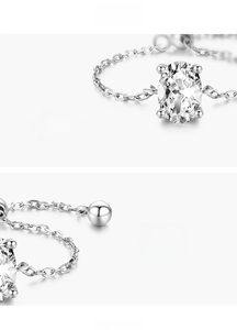 Detailed macro of S925 sterling silver chain ring with oval-cut 5A grade zircon stone