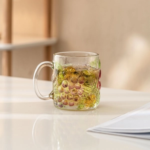 Hand-painted glass cup with grape embossing and handle for coffee or tea