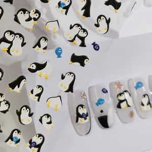 3D cartoon penguin nail art stickers with blue fish and gold snowflake patterns
