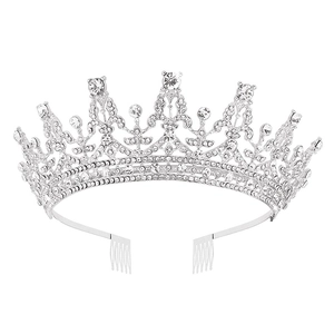 Silver bridal crown tiara with sparkling rhinestones and securing combs on white background