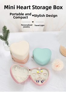 Macro shot of heart-shaped PU leather jewelry boxes with zipper closure and velvet lining