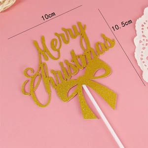 Décoration de gâteau dorée pailletée Merry Christmas avec nœud sur fond rose