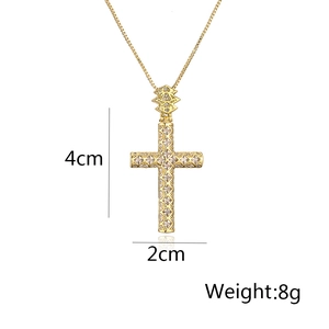 Detailed view of a gold-plated cross pendant with dimensions 4cm x 2cm and 8g weight