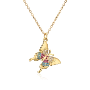 Gold butterfly pendant necklace with multicolored zircon stones on white background